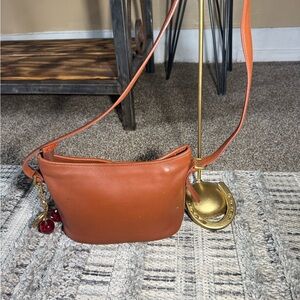 Vintage Coach bag in good condition, brown leather crossbody bag with cherry.